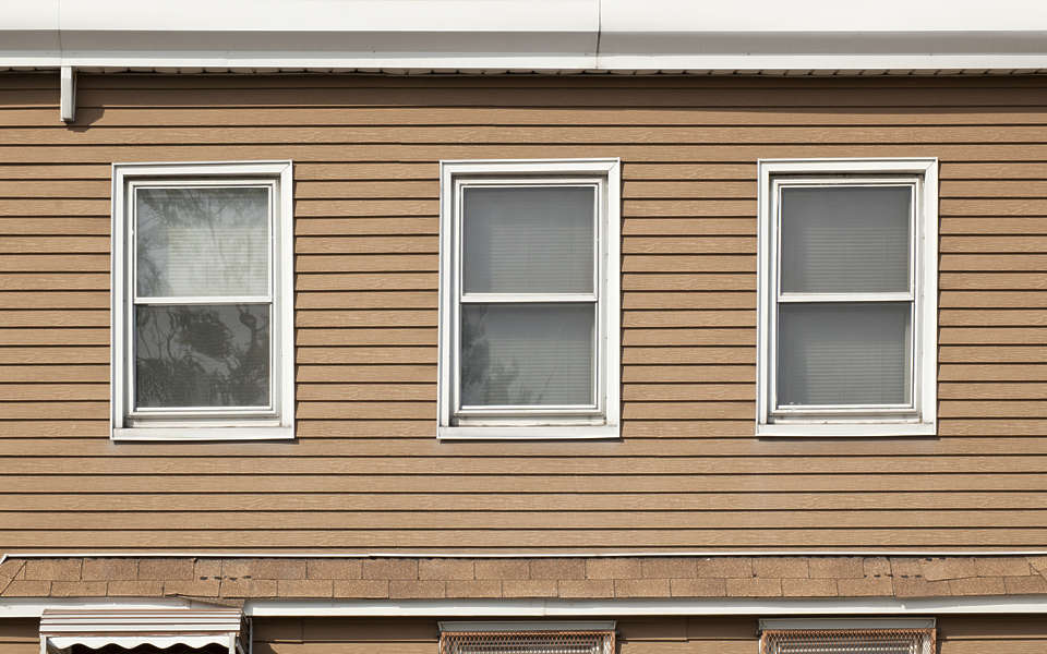 White House With Stained Wood Shutters White House With Stained Wood Shutters